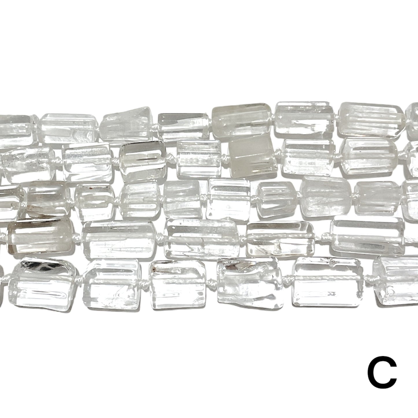 Fil de perles Cristal de roche forme allongé multiple variante A - Foliesbijoux