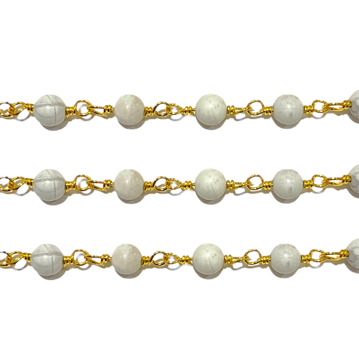 Chaîne avec boule Howlite blanche au mètre laiton - Foliesbijoux