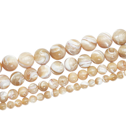 Strand of golden mother-of-pearl beads A