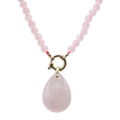 Collier boule en Quartz rose attache bouée en acier doré avec pendentif