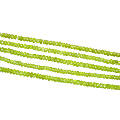 Fil de pierre Péridot AAA 6x3 mm facetté