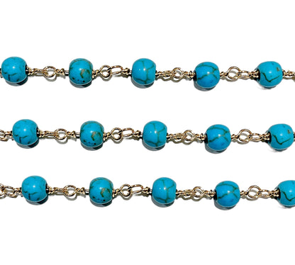 Chaîne avec boule en Howlite turquoise au mètre laiton