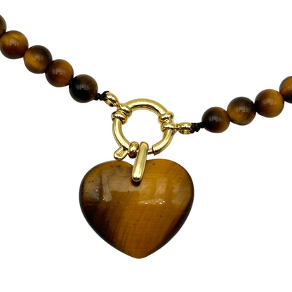 Collier boule en oeil de tigre attache bouée en acier dorée avec pendentif coeur