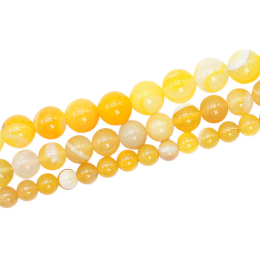 Strand of heated yellow Agate beads