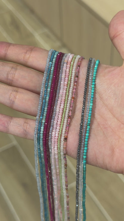 Strand of faceted square beads 2x2 mm (9 stones available)