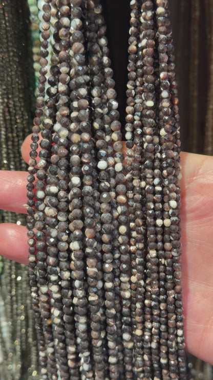 Fil nacre noire en perle facetté