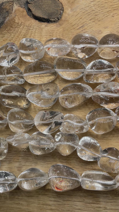 Fil de perles en Cristal de roche avec inclusion 25x15 mm