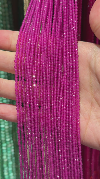 Fil Corindon teinte violette (Rubis) en perle facetté 2 mm