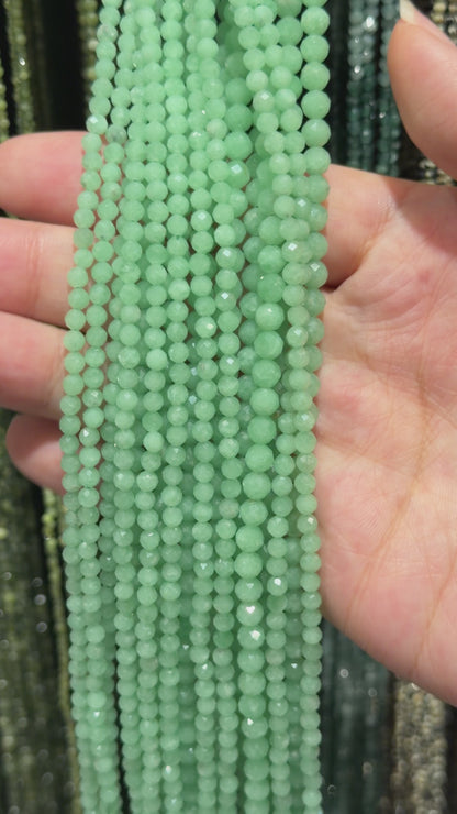 Strand of faceted green Jade beads