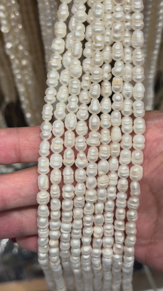 Fil de perle d’eau douce 5-6 mm [59]