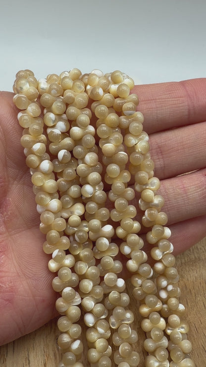 Gold mother-of-pearl thread 6x6 mm