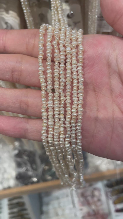 Fil de perle d’eau douce 2-3 mm [7]