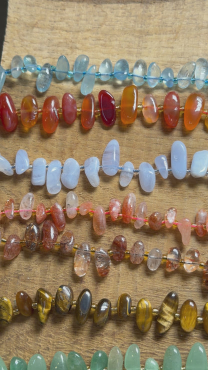 Fil de perles forme libre 6x14 mm (7 pierres disponible)